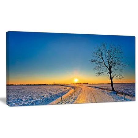 Design Art 'Distant Sunset in Winter' Photographic Print on Wrapped Canvas - Size: 20 inch H x 40 inch W x 1 inch D, Yellow