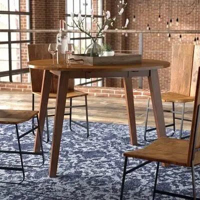 Osya Round Dropleaf Extendable Dining Table George Oliver
