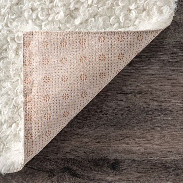 nuLOOM Marlow Machine Washable Soft Shaggy Faux Sheepskin Area Rug - 6& x 9& - White
