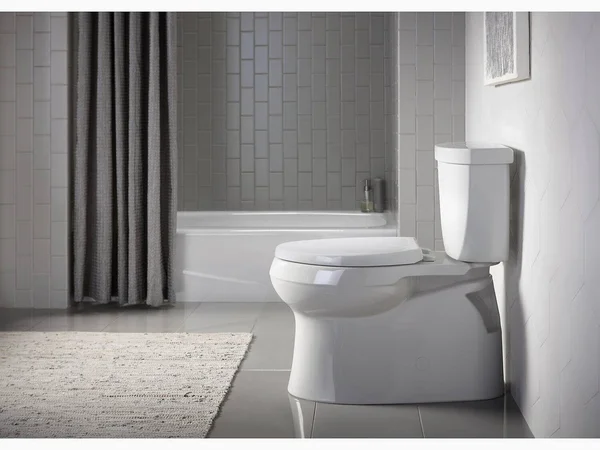 Kohler 5310-NY Cimarron Comfort Height Two-Piece Elongated 1.28 GPF Toilet with Skirted Trapway - Dune